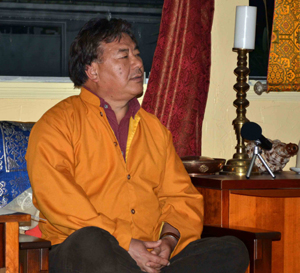 Geshe  Teaching from chair